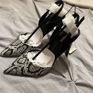 NWT Express snakeskin heels.